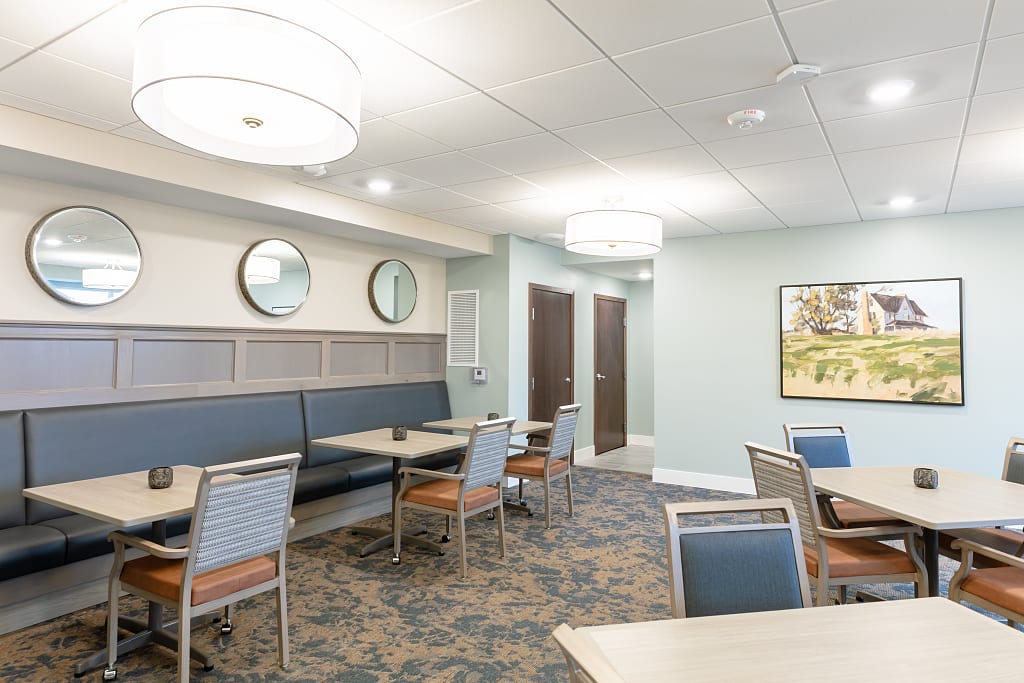 Communal dining area with booth seating.